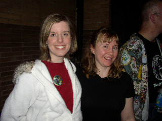 the two women smile for the camera