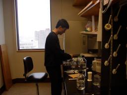 Brian engrossed in his experiment