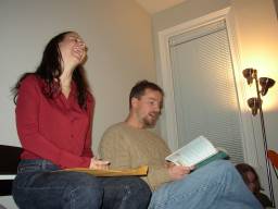 Ravitte laughing and Matthew reading aloud.