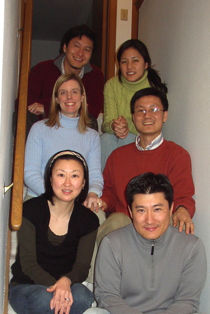 The cousins sit on the stairs.JPG