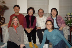 Brian's family sits on the couch